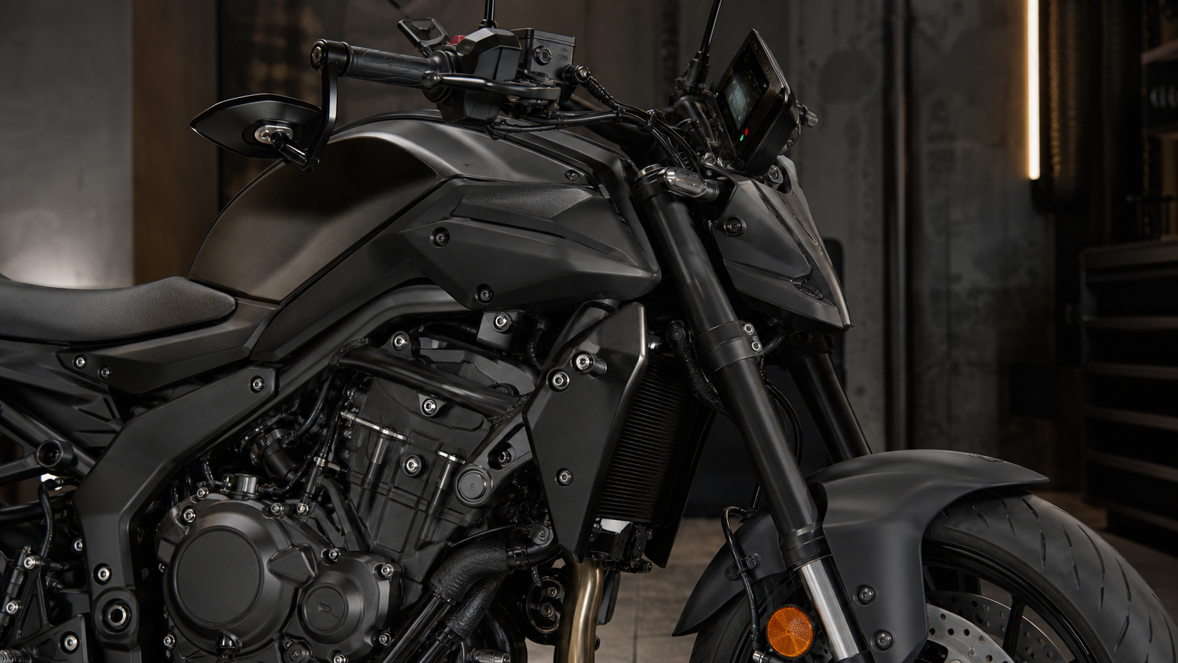 Yamaha MT-07 Y-AMT CP2 689cc engine Y-AMT switchgear TFT cockpit and radial brake detail in an industrial inspection bay